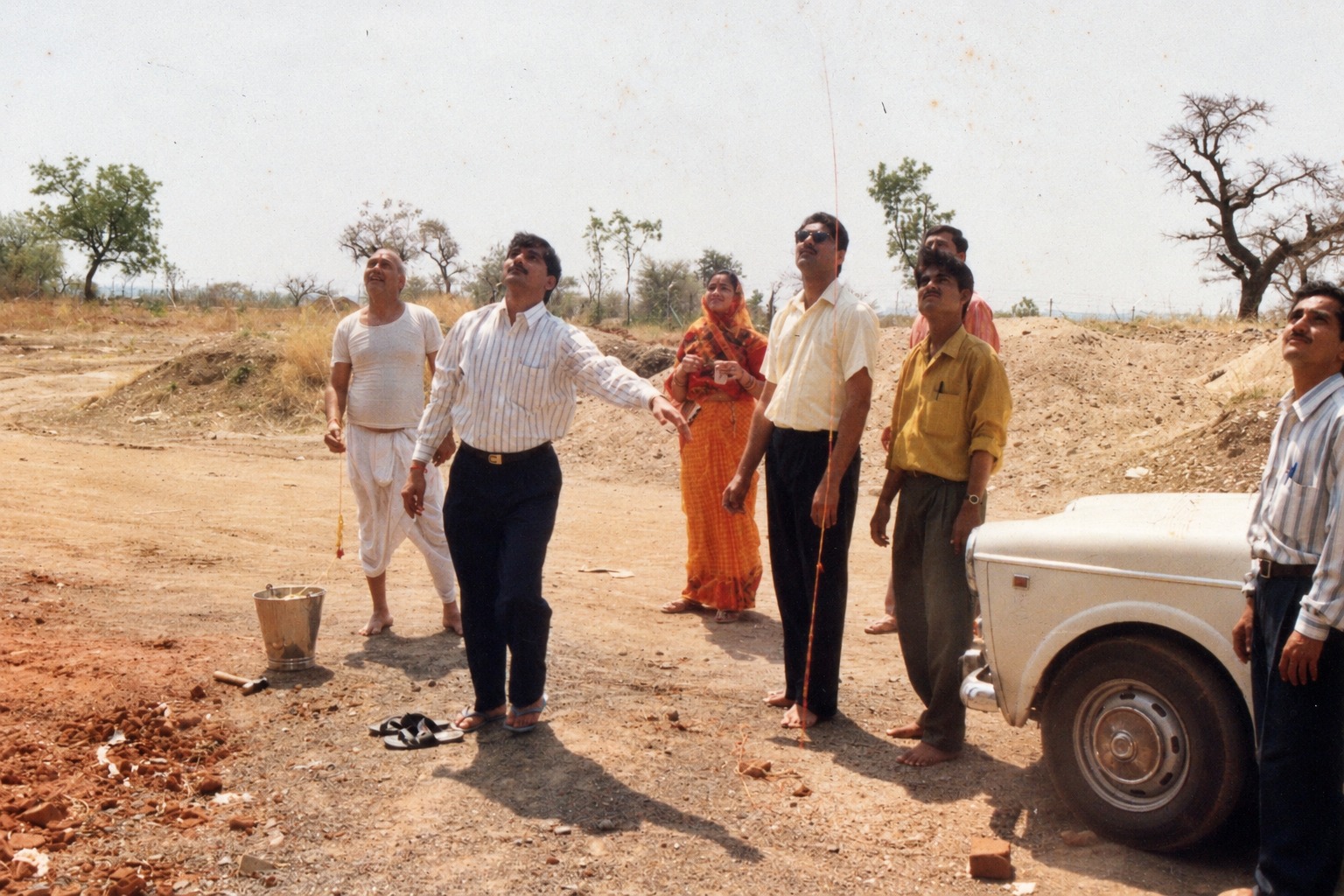 People gathered at the early construction site